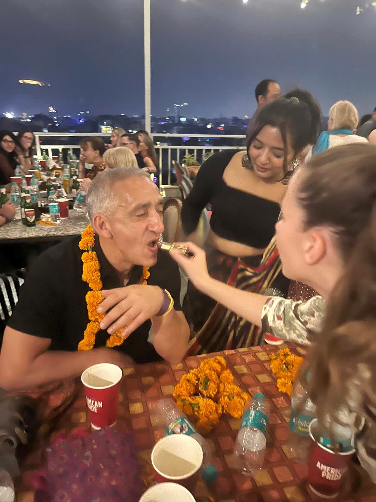 Diyas and marigold garlands lit for a festival celebration in India