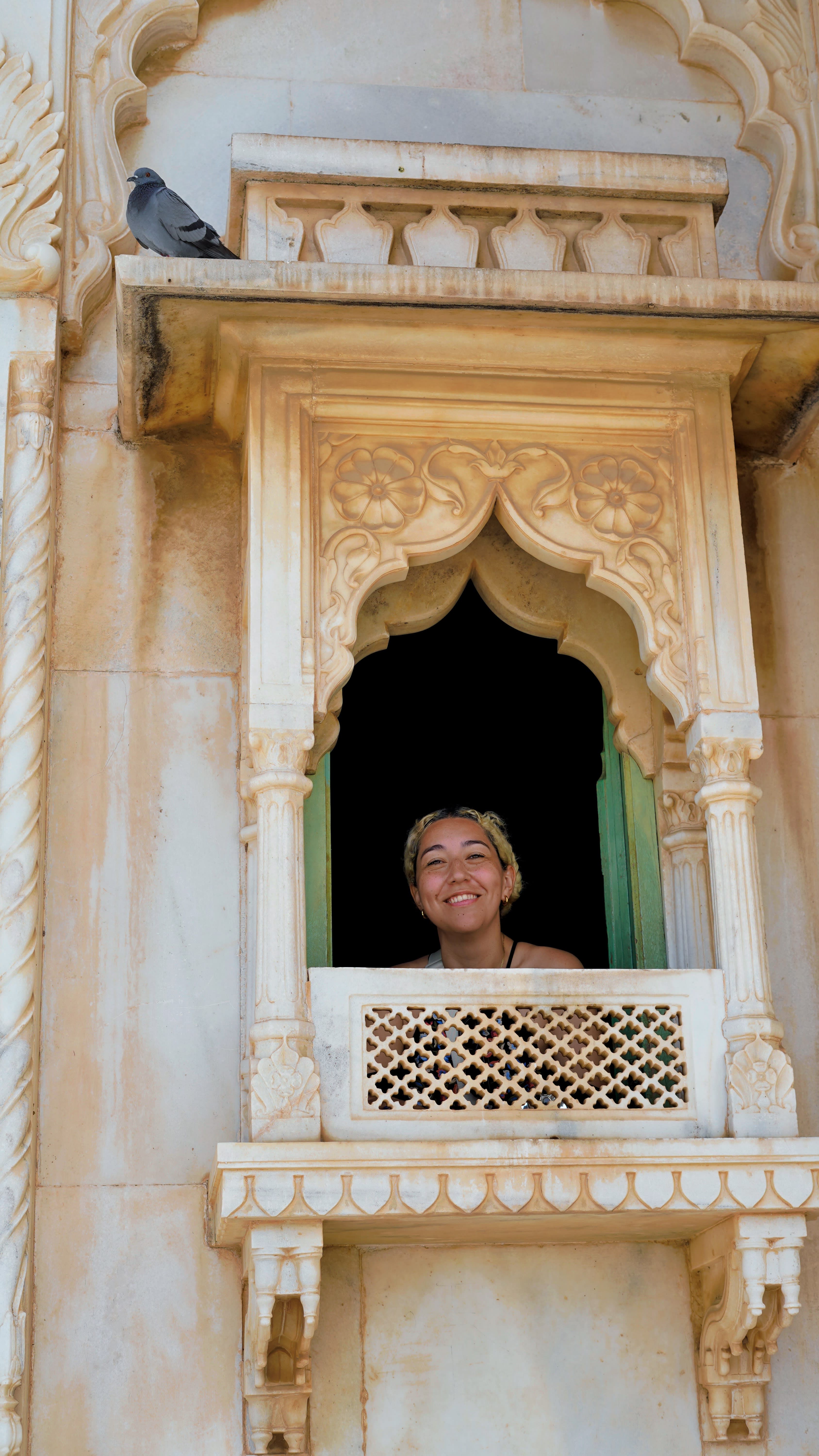 A small group of travellers with their host in India