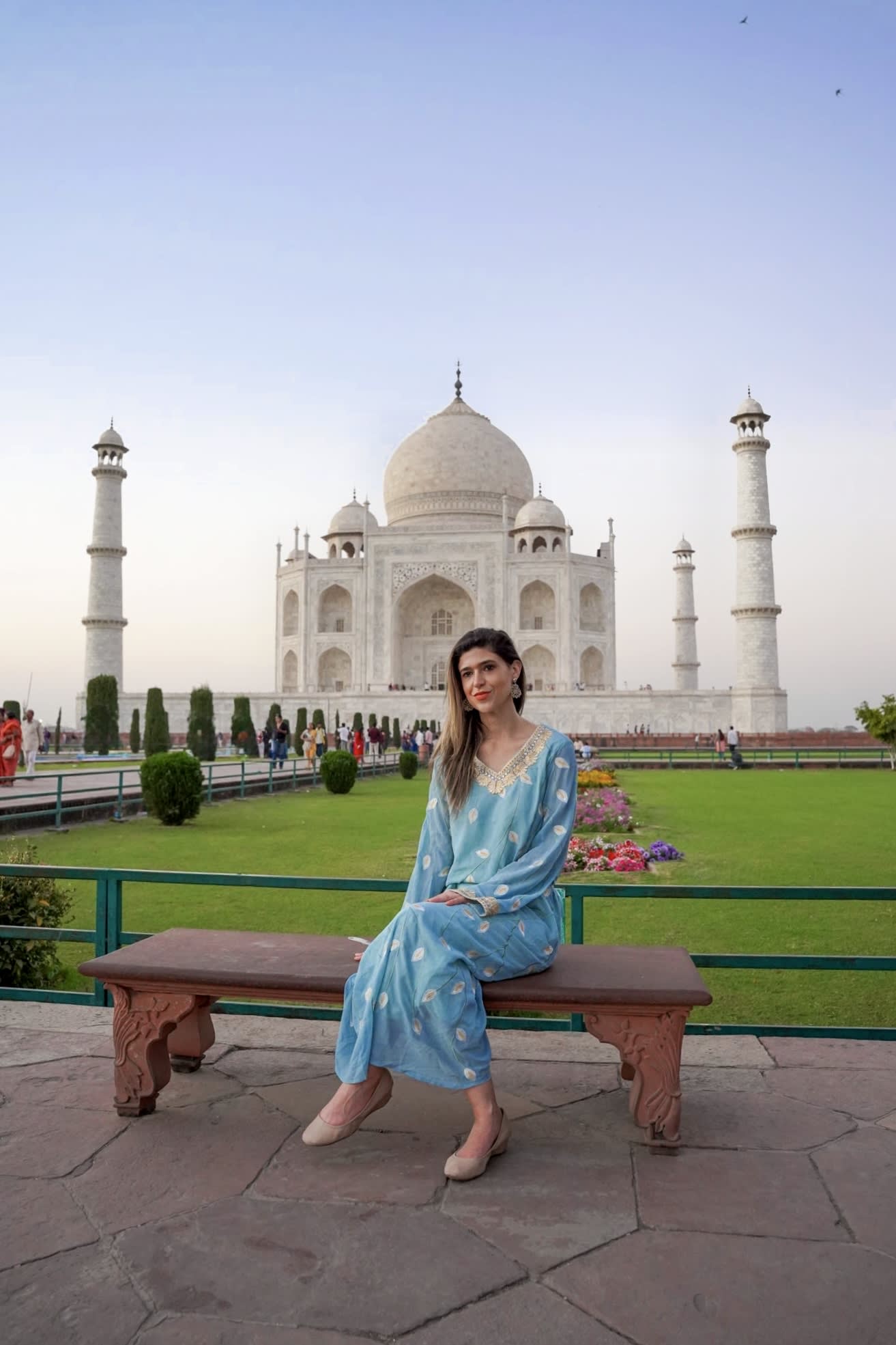 Travellers exploring a Golden Triangle landmark in India